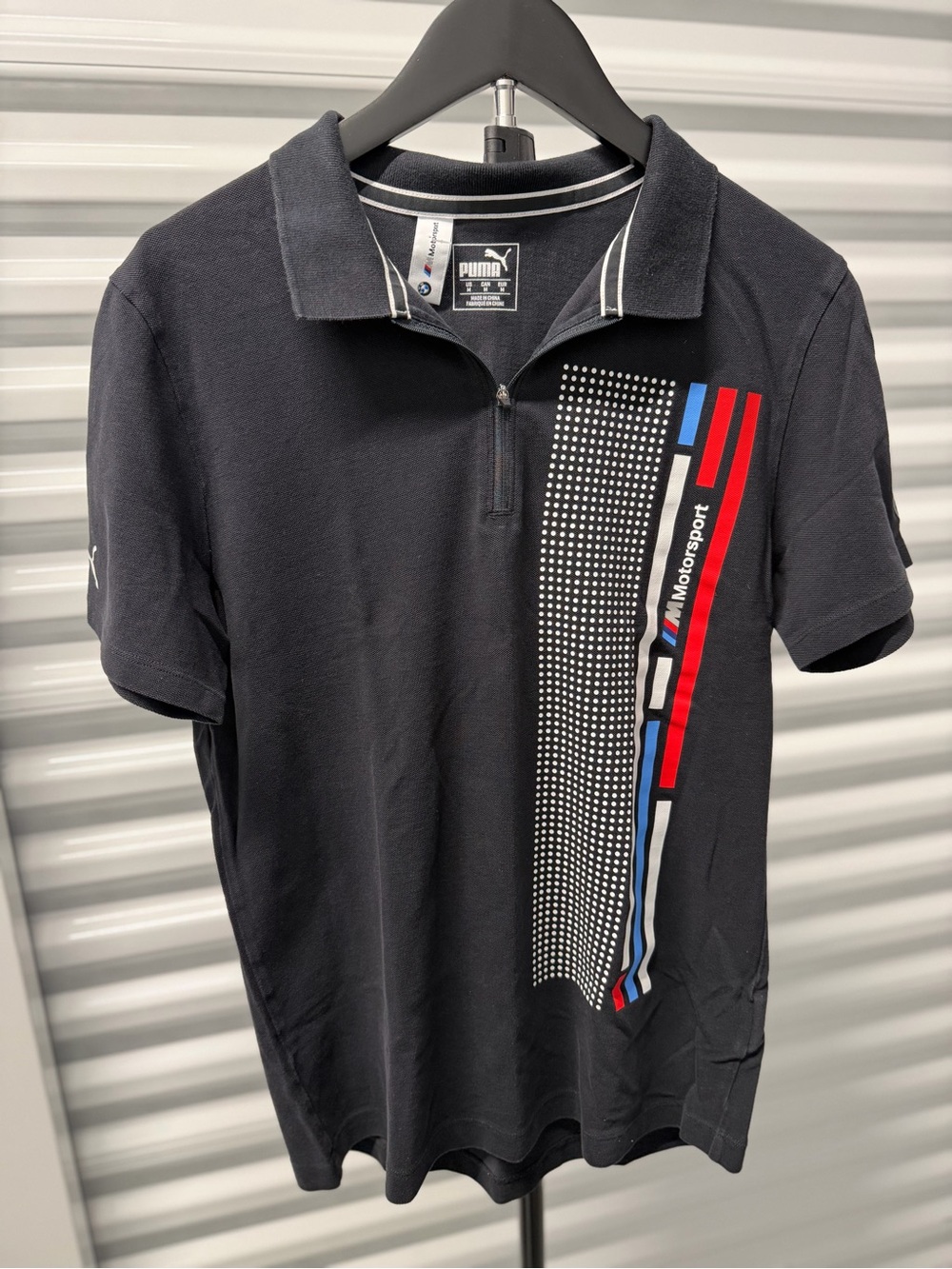 Puma Black Polo with Red and Blue Motorsport Accents